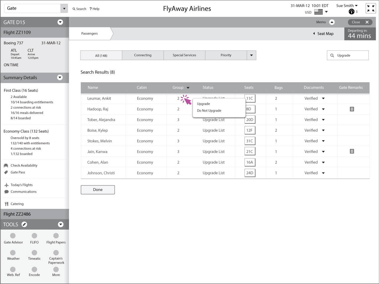 Gate agent giving a passenger an upgrade